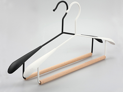 Space saving black and white metal hanger with beech wood bar