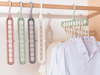 Closet Organizer Magic Racks Space Saving Plastic Hangers with 9 Holes